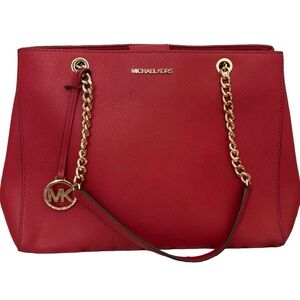 Beautiful bright red w/gold accents Michael Kors purse